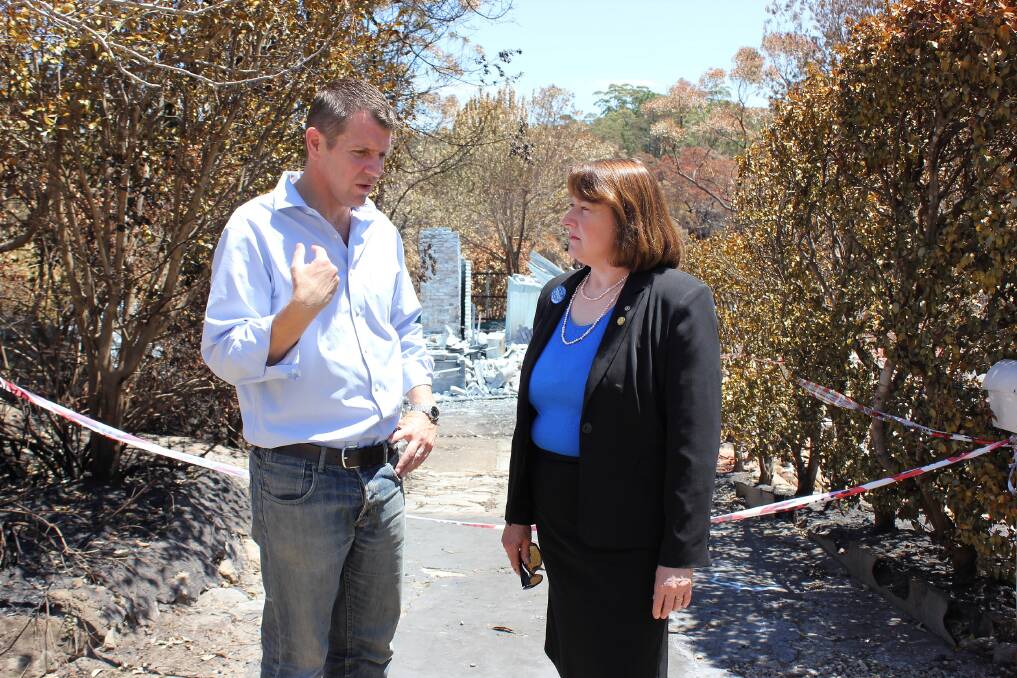 NSW treasurer Mike Baird had a look at bushfire-affected areas in Springwood and Winmalee with Blue Mountains MP Roza Sage on Saturday.